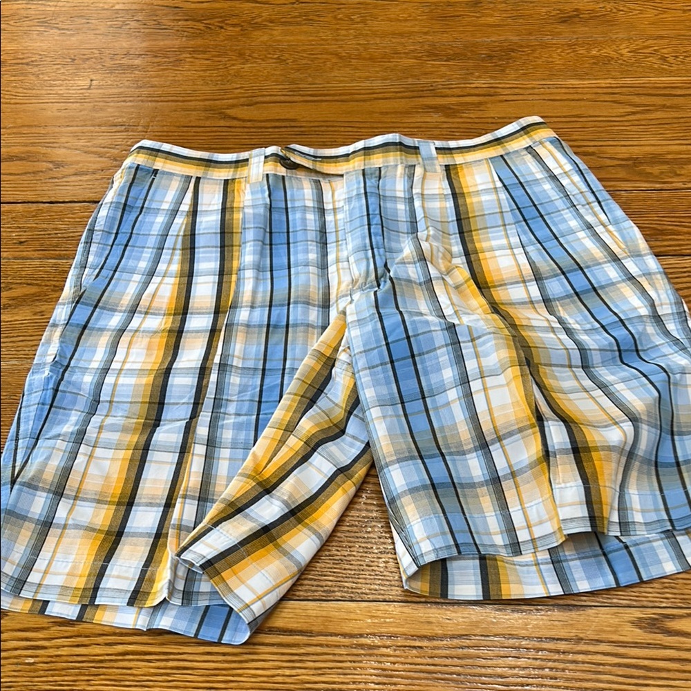 Cutter & Buck yellow and blue plaid golf shorts. Excellent condition. Size 34x9”